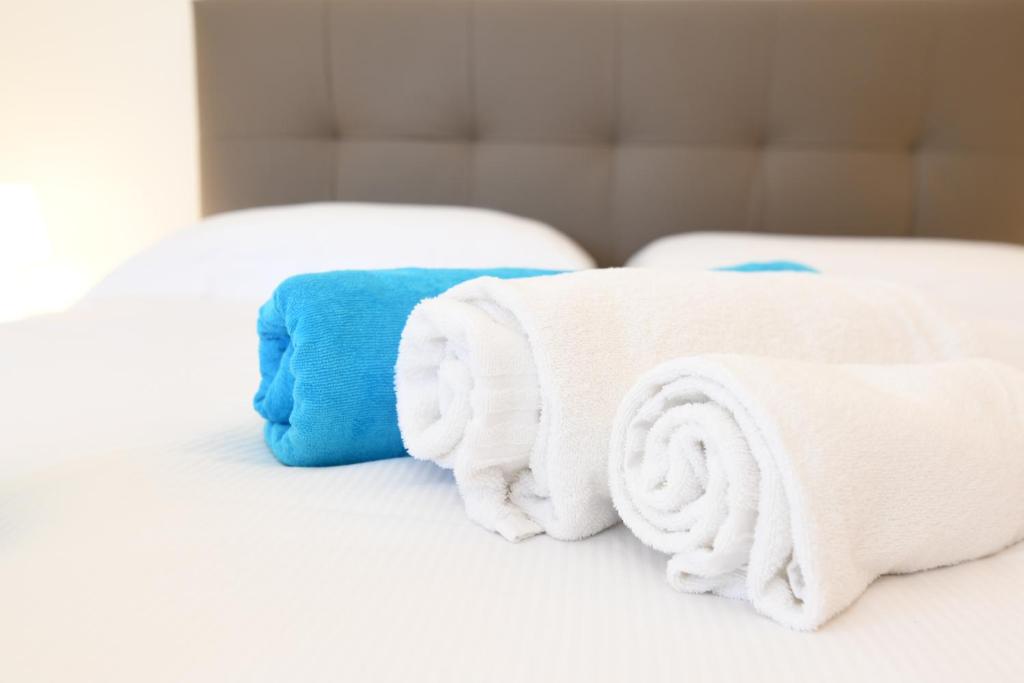 Posteľ alebo postele v izbe v ubytovaní Casa Raffaella -Ciao Vacanze-