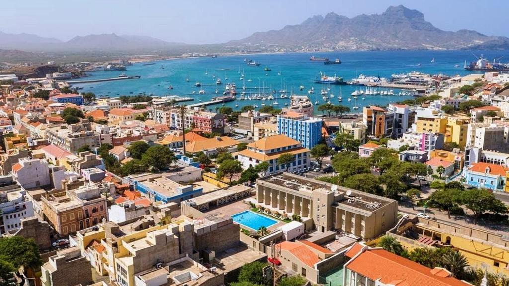an aerial view of a city with a harbor at T1 Família Luz in Mindelo