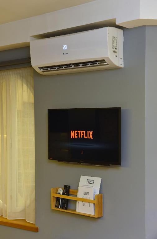 TV a/nebo společenská místnost v ubytování Walk Inn Váci 78
