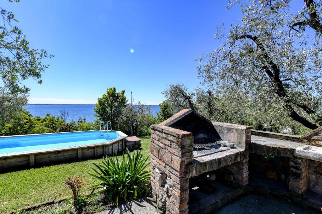 Bazén v ubytovaní Casa Raffaella -Ciao Vacanze- alebo v jeho blízkosti