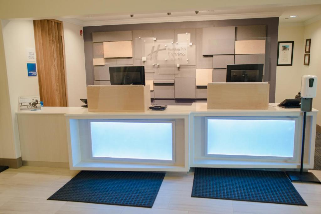a store counter with boxes on top of it at Holiday Inn Express Winona, an IHG Hotel in Winona