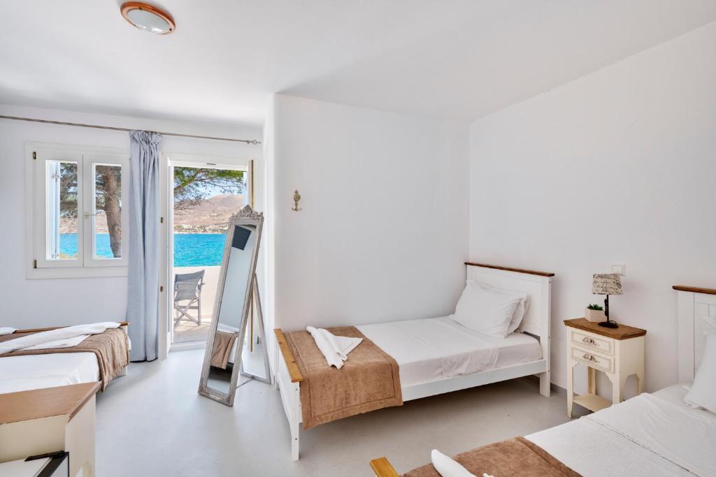 Postel nebo postele na pokoji v ubytování ''Di Mare'' Hotel & Suites