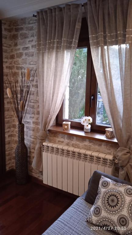 Postel nebo postele na pokoji v ubytování Apartamento con terraza al Puente Romano