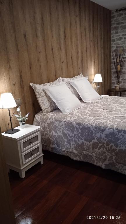 Postel nebo postele na pokoji v ubytování Apartamento con terraza al Puente Romano