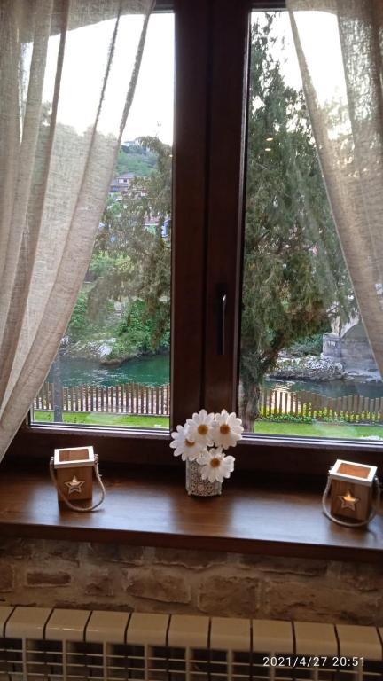 Balkón nebo terasa v ubytování Apartamento con terraza al Puente Romano