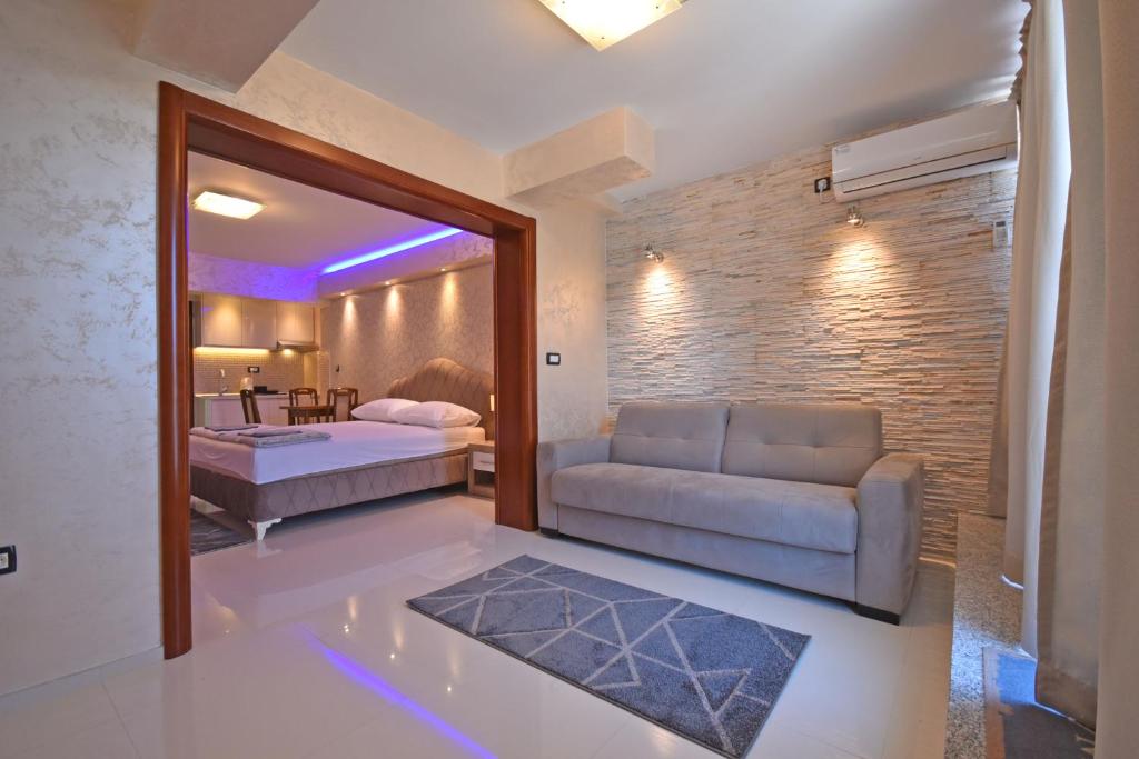 Postel nebo postele na pokoji v ubytování Apartments Daki