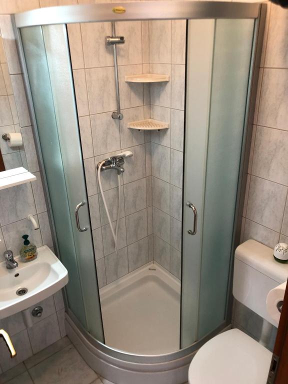 Koupelna v ubytování Apartments Mira