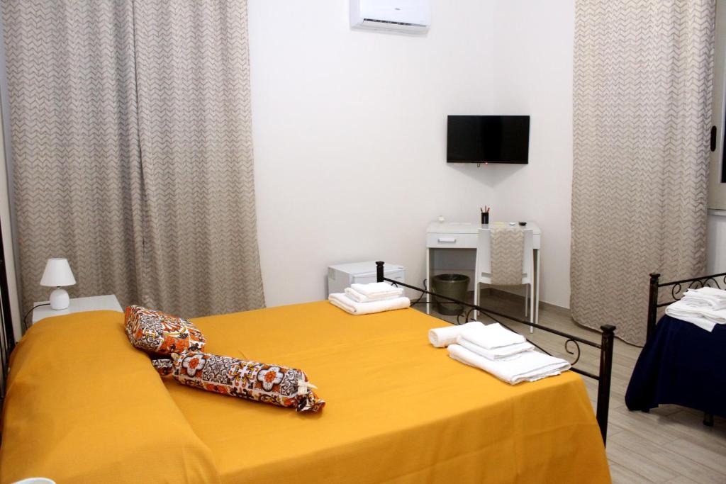 Postel nebo postele na pokoji v ubytování B&B Ciccannina
