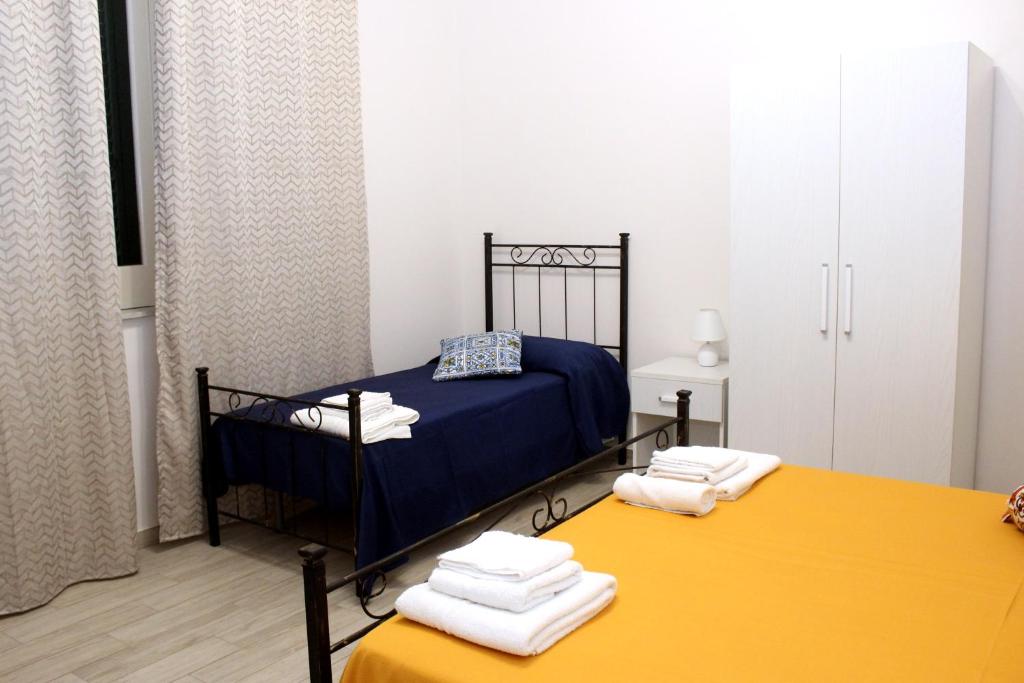 Postel nebo postele na pokoji v ubytování B&B Ciccannina