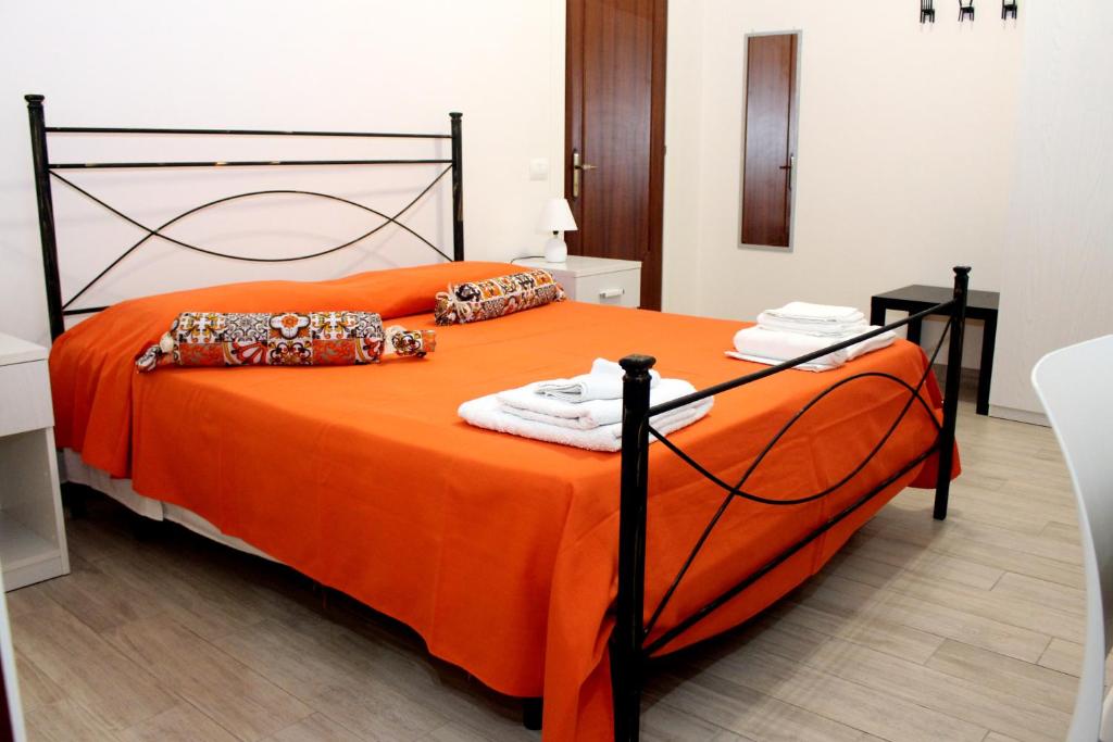 Postel nebo postele na pokoji v ubytování B&B Ciccannina