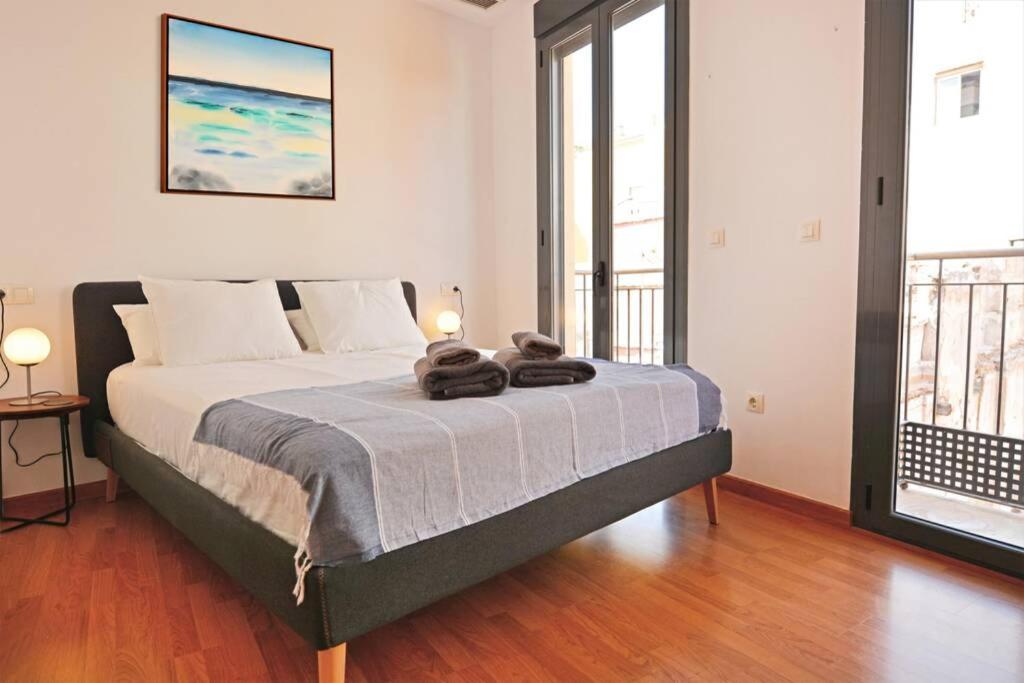 Postel nebo postele na pokoji v ubytování Penthouse in old city center by NRAS
