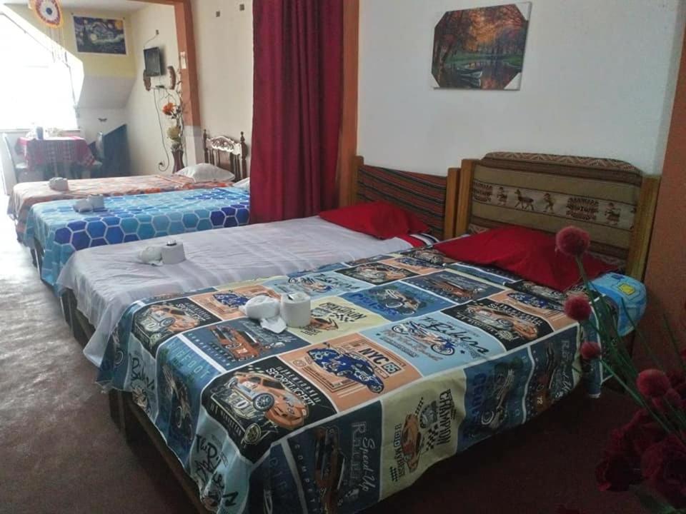 Postel nebo postele na pokoji v ubytování Inti Hostel Airport