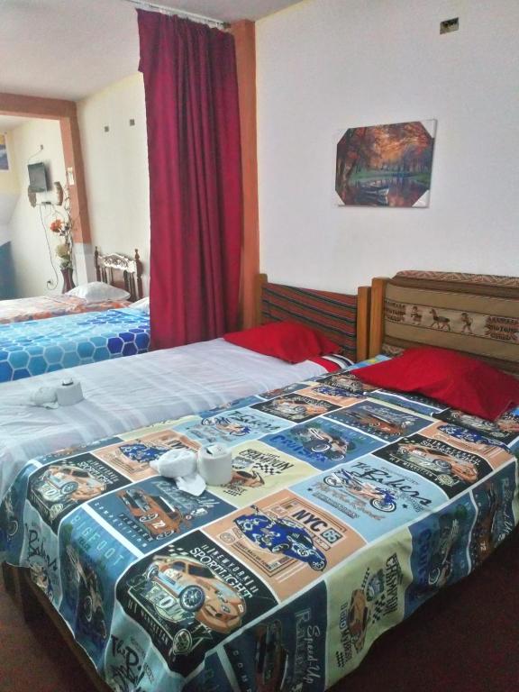 Postel nebo postele na pokoji v ubytování Inti Hostel Airport