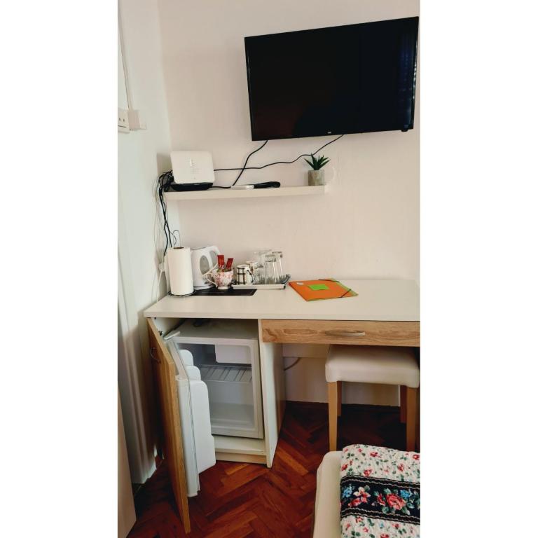 Kuchyň nebo kuchyňský kout v ubytování Rooms Verda