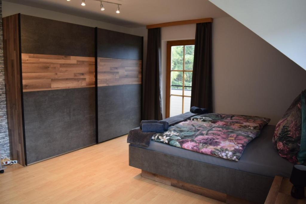 Ένα ή περισσότερα κρεβάτια σε δωμάτιο στο Ferienwohnung Familie Pichler