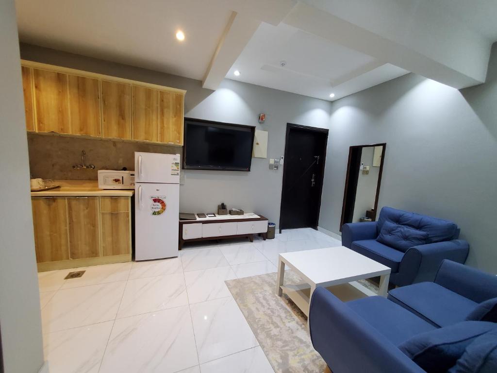Kuchyň nebo kuchyňský kout v ubytování Landmark Hotel Suites