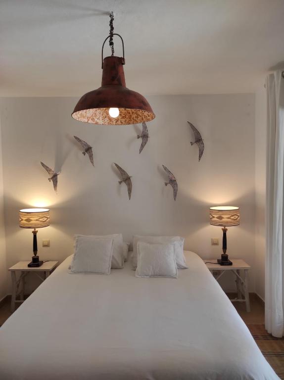 Łóżko lub łóżka w pokoju w obiekcie CASA 4 HABITACIONES CON JARDIN 10 Pax