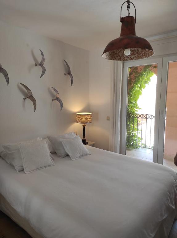 Łóżko lub łóżka w pokoju w obiekcie CASA 4 HABITACIONES CON JARDIN 10 Pax