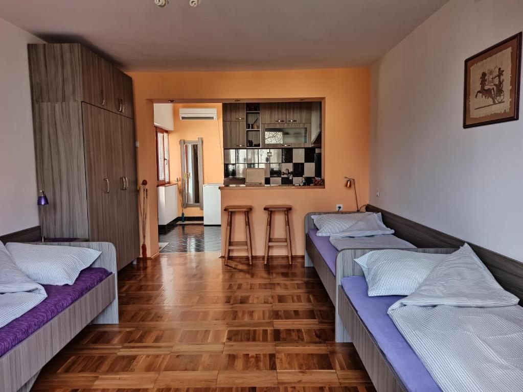 Postel nebo postele na pokoji v ubytování Apartman Ristic