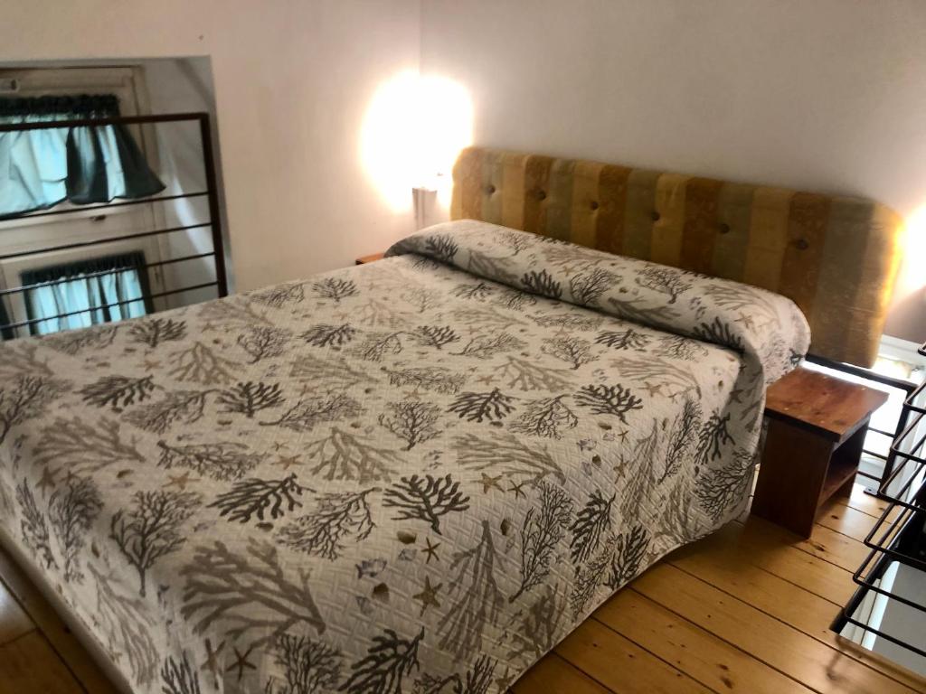 Postel nebo postele na pokoji v ubytování Affittacamere Monterosso 5 Terre