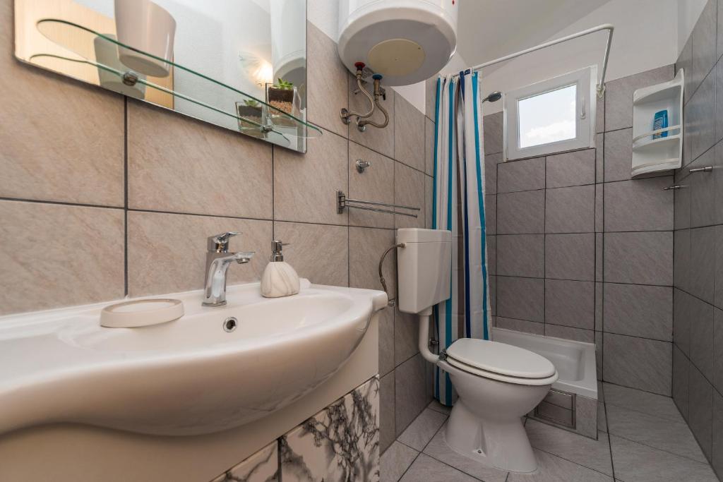 Kúpeľňa v ubytovaní Apartments Marko Dominik