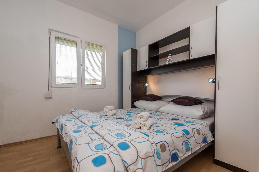 Posteľ alebo postele v izbe v ubytovaní Apartments Marko Dominik