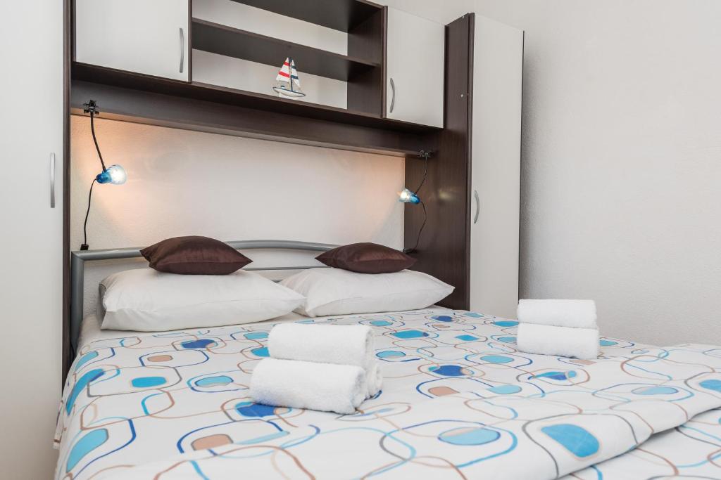 Posteľ alebo postele v izbe v ubytovaní Apartments Marko Dominik