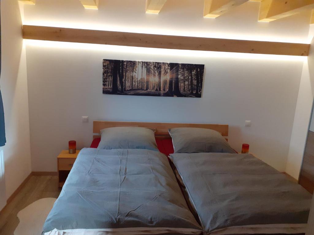 Postel nebo postele na pokoji v ubytování Ferienhaus Herbstzauber