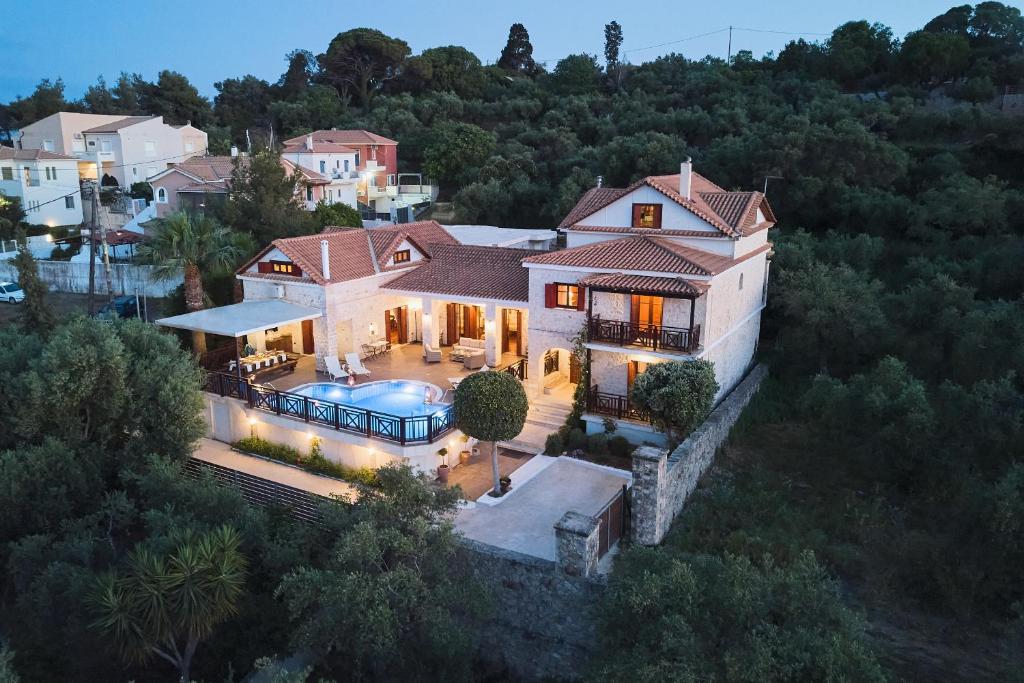 an aerial view of a house with a swimming pool at Lila's Luxury Villa in Akrotiri
