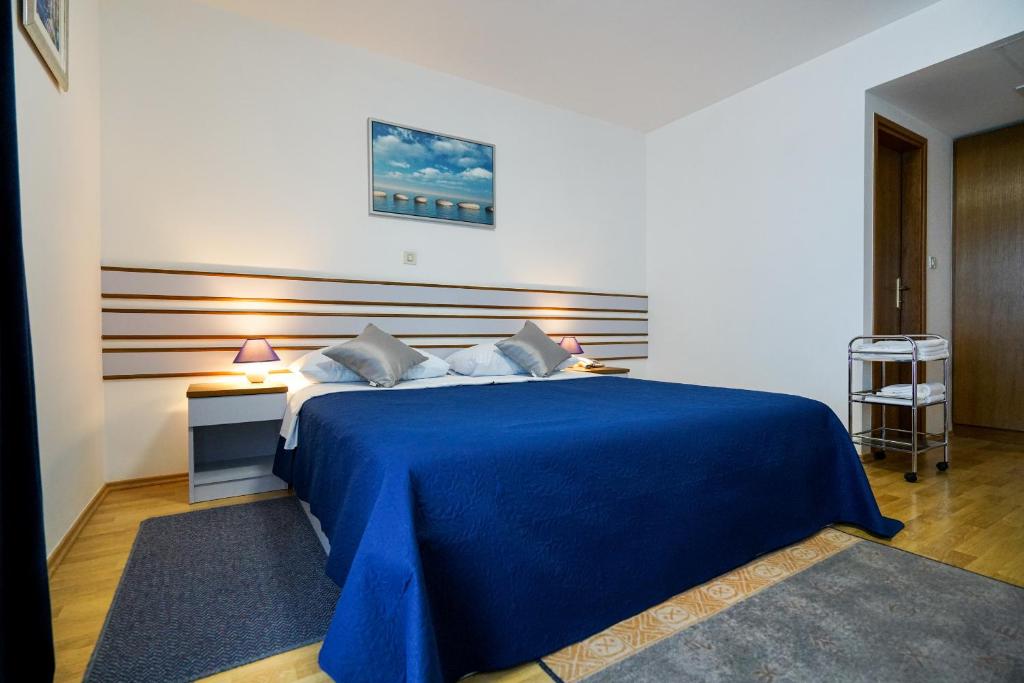 Posteľ alebo postele v izbe v ubytovaní Hotel Belvedere