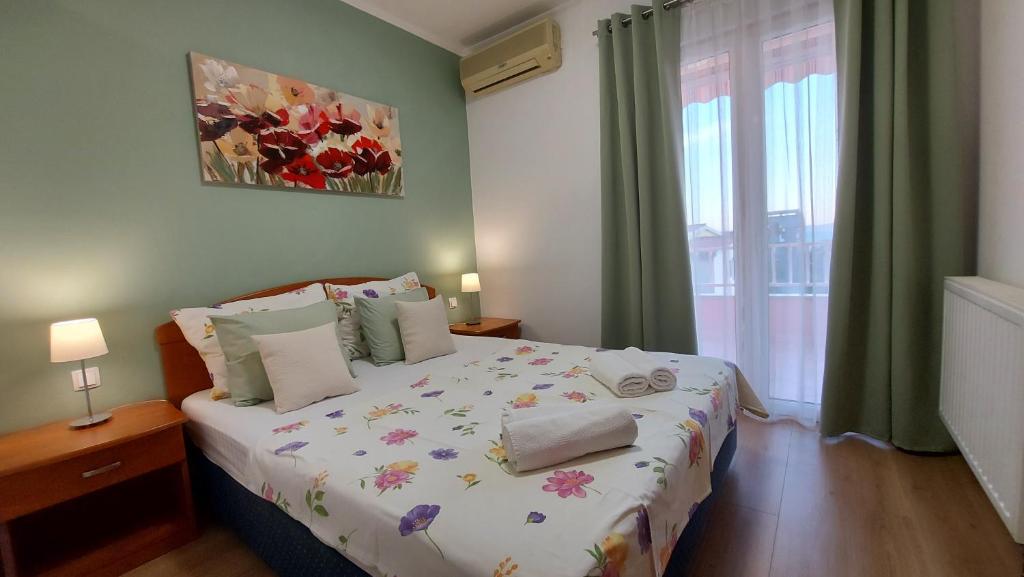 Postel nebo postele na pokoji v ubytování Villa Rossa