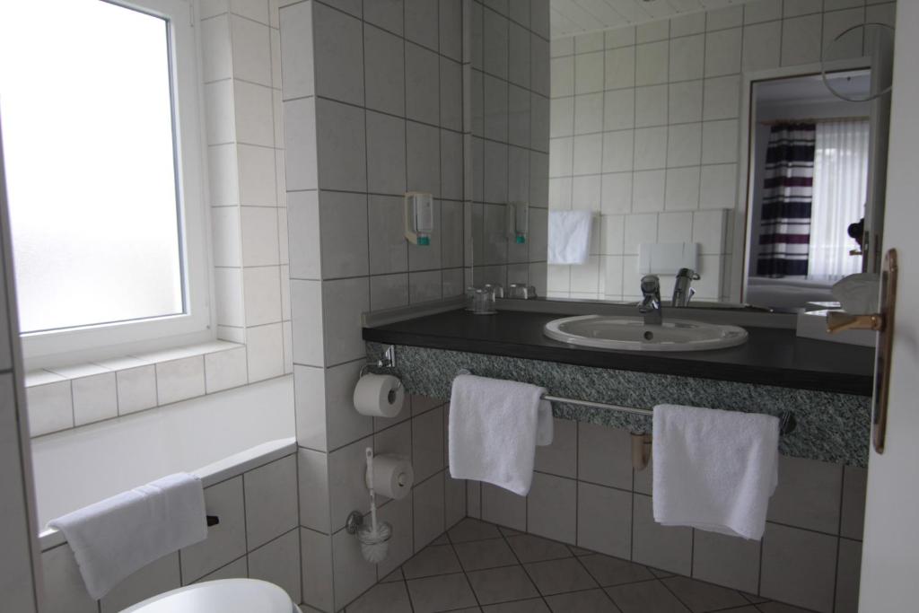 Koupelna v ubytování Hotel Linden