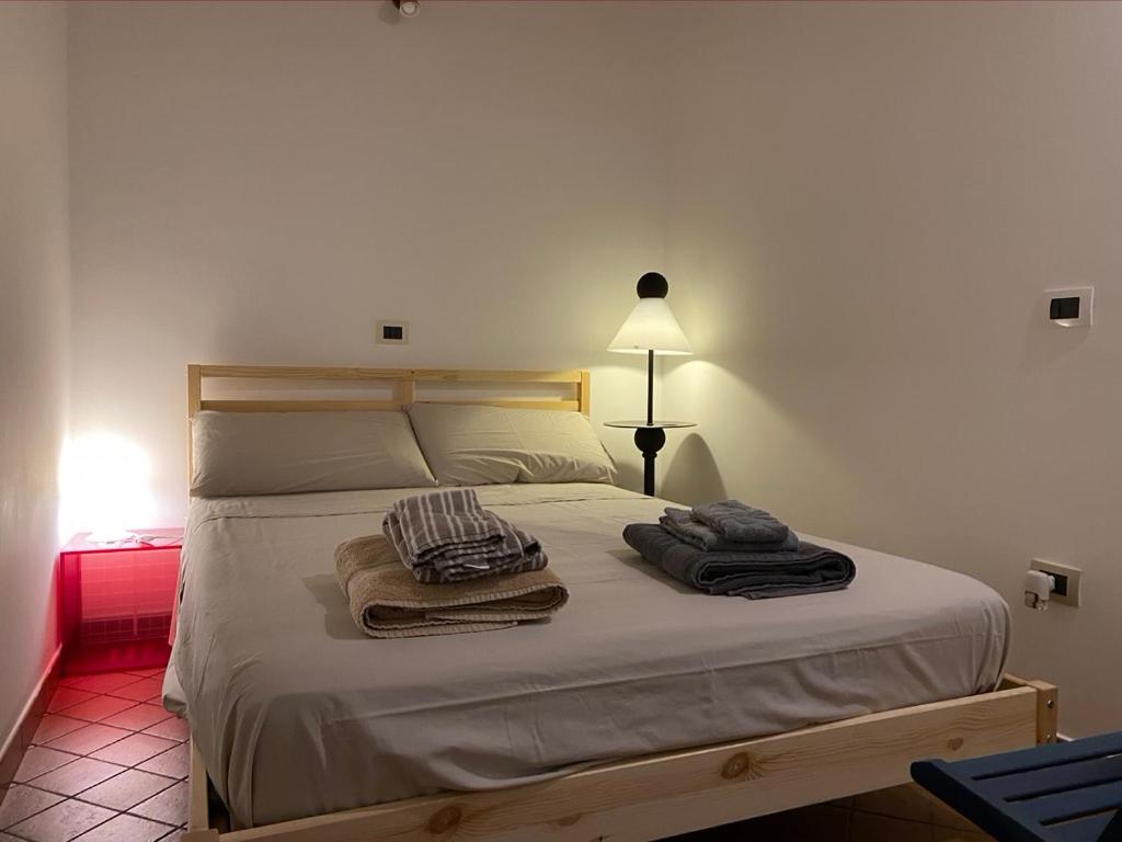 Posteľ alebo postele v izbe v ubytovaní Karrua House