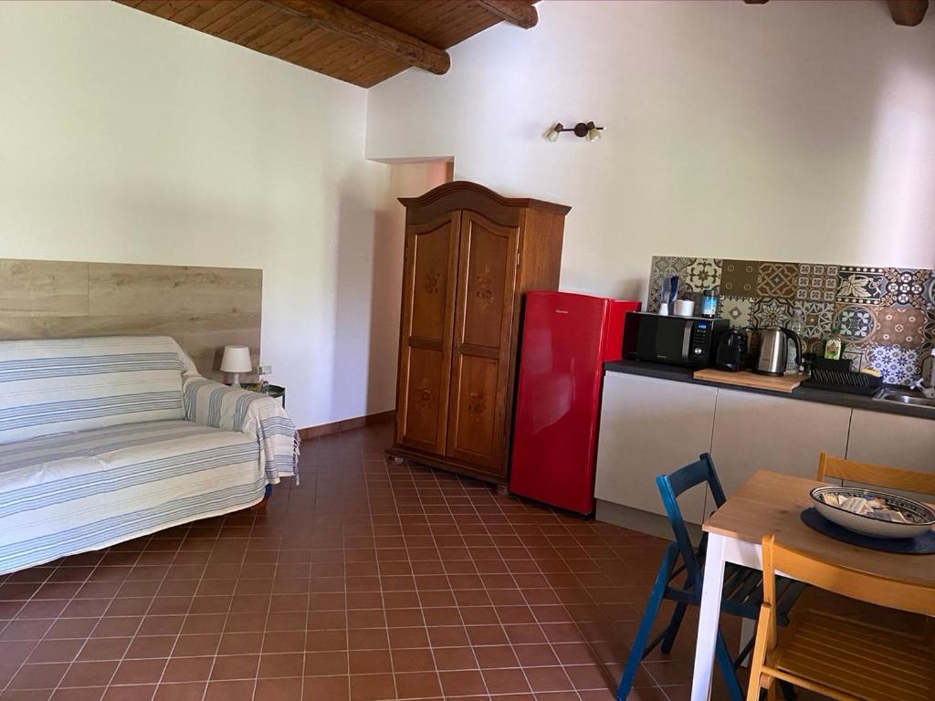 Posteľ alebo postele v izbe v ubytovaní Karrua House