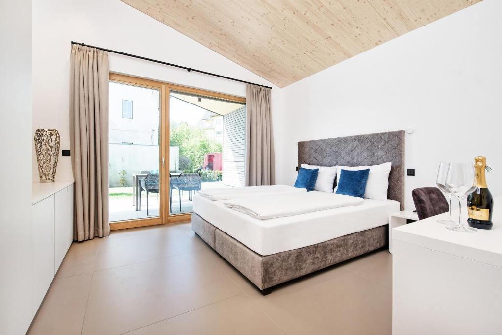 Postel nebo postele na pokoji v ubytování Apartment Velden - 24 Home im Zentrum