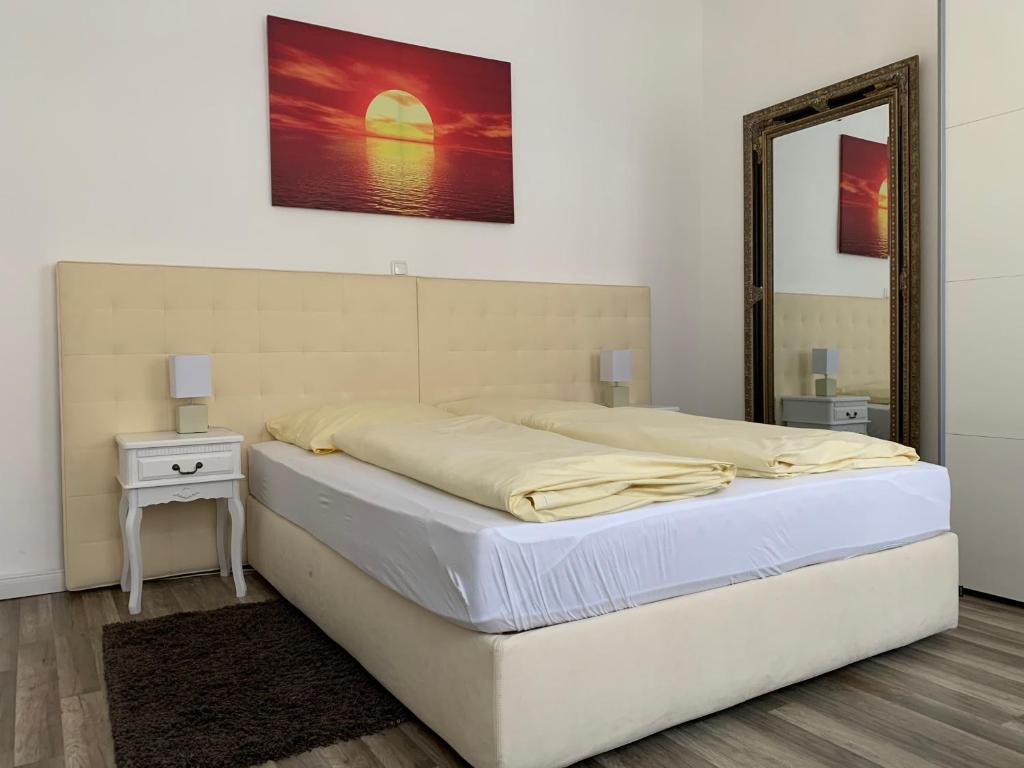 Postel nebo postele na pokoji v ubytování Maxima
