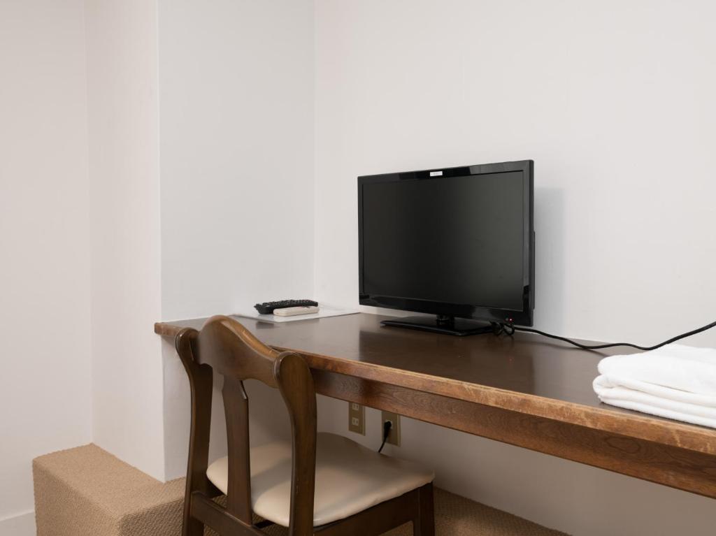 TV a/nebo společenská místnost v ubytování Hotel WWJ