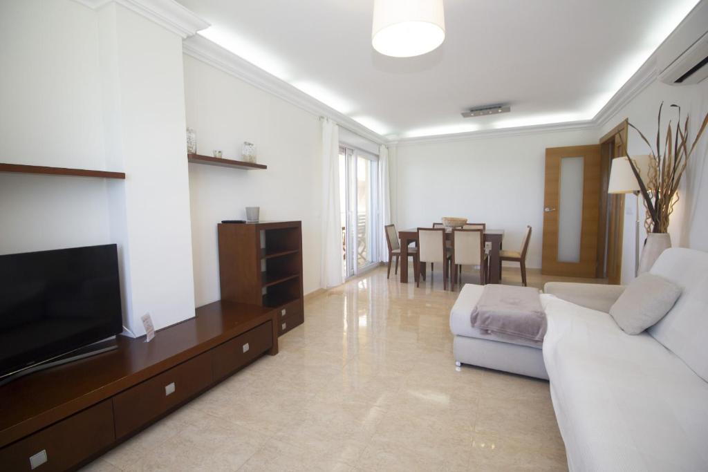 A television and/or entertainment centre at Spanish Connection - Playa Principe