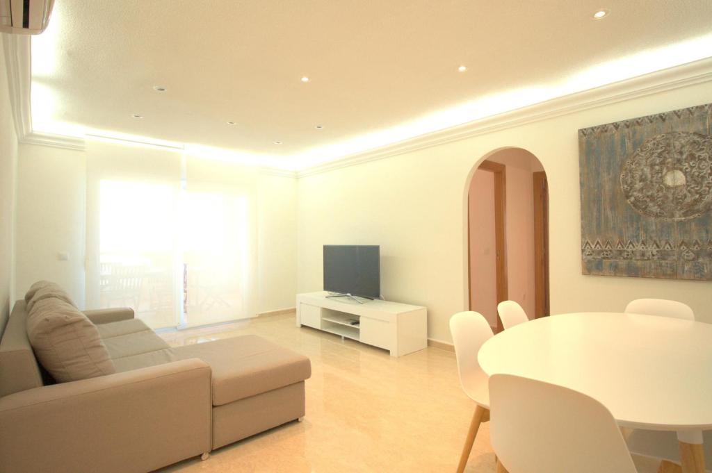 A television and/or entertainment centre at Spanish Connection - Playa Principe