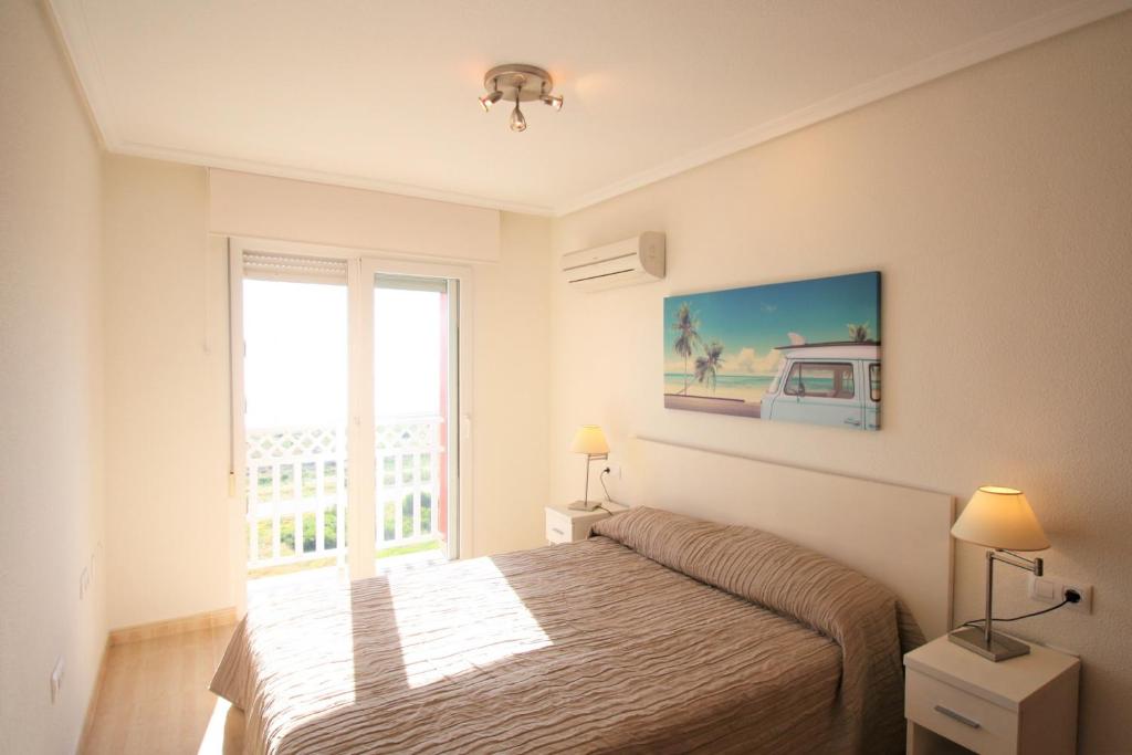 A bed or beds in a room at Spanish Connection - Seychelles