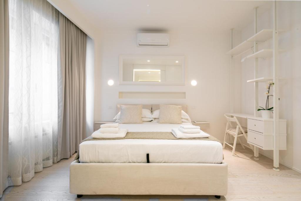 Posteľ alebo postele v izbe v ubytovaní Suite Jasmine by Mmega
