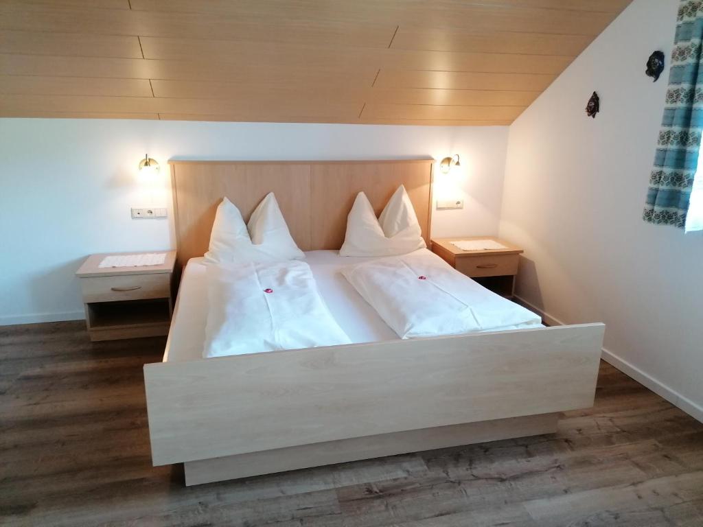 Postel nebo postele na pokoji v ubytování Stegerhof