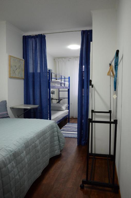 Postel nebo postele na pokoji v ubytování ArtOtrada Mini-hotel