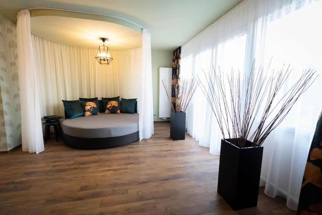Postel nebo postele na pokoji v ubytování Allure Healthy Hotel & Spa
