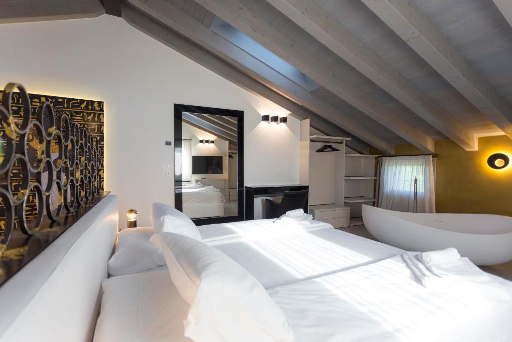 Postel nebo postele na pokoji v ubytování Agriturismo Redó