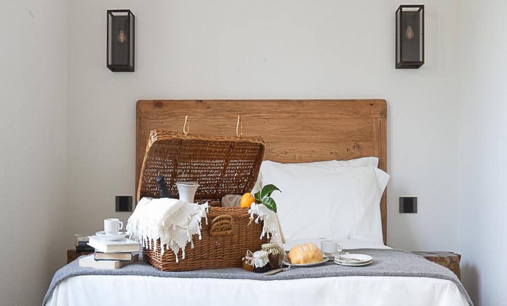 Postel nebo postele na pokoji v ubytování Albergo Rurale Casa Fois