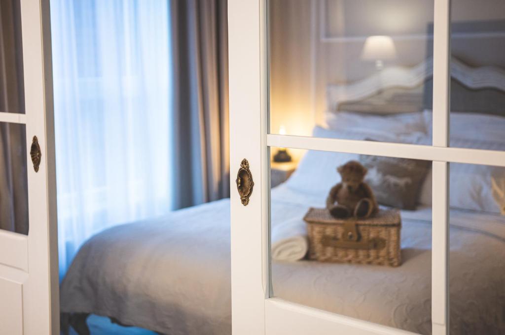 Posteľ alebo postele v izbe v ubytovaní Wyjatkowy apartament w sercu Gdańska