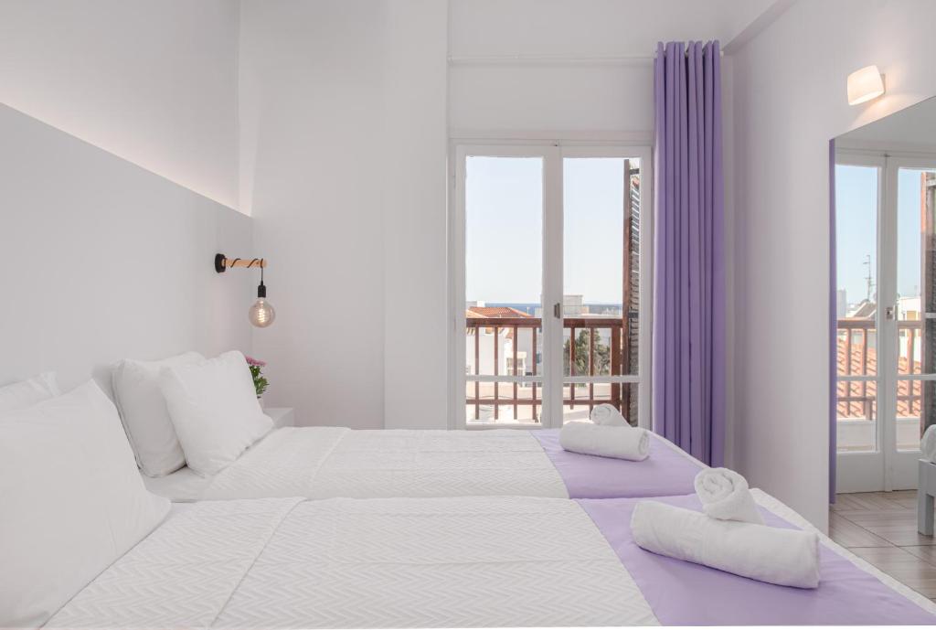 Postel nebo postele na pokoji v ubytování Venus Minimal Hotel
