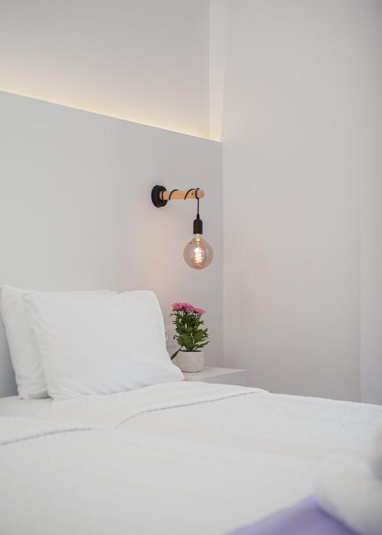 Postel nebo postele na pokoji v ubytování Venus Minimal Hotel