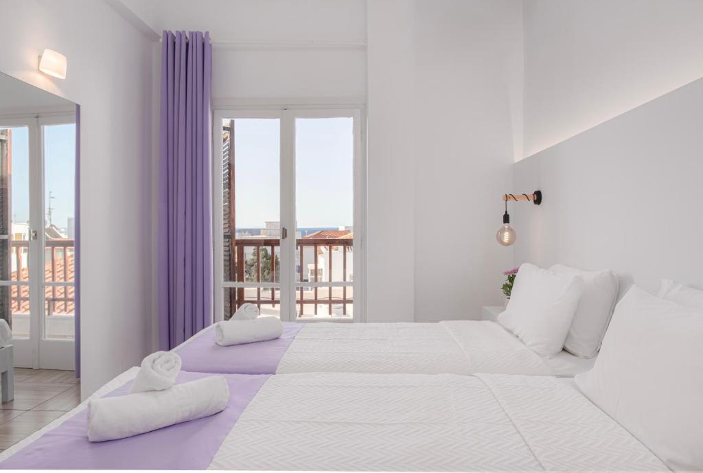 Postel nebo postele na pokoji v ubytování Venus Minimal Hotel